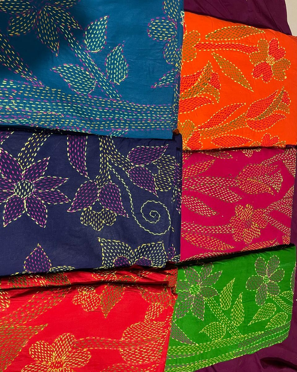 Close view of the six kantha throw colours and their stitching